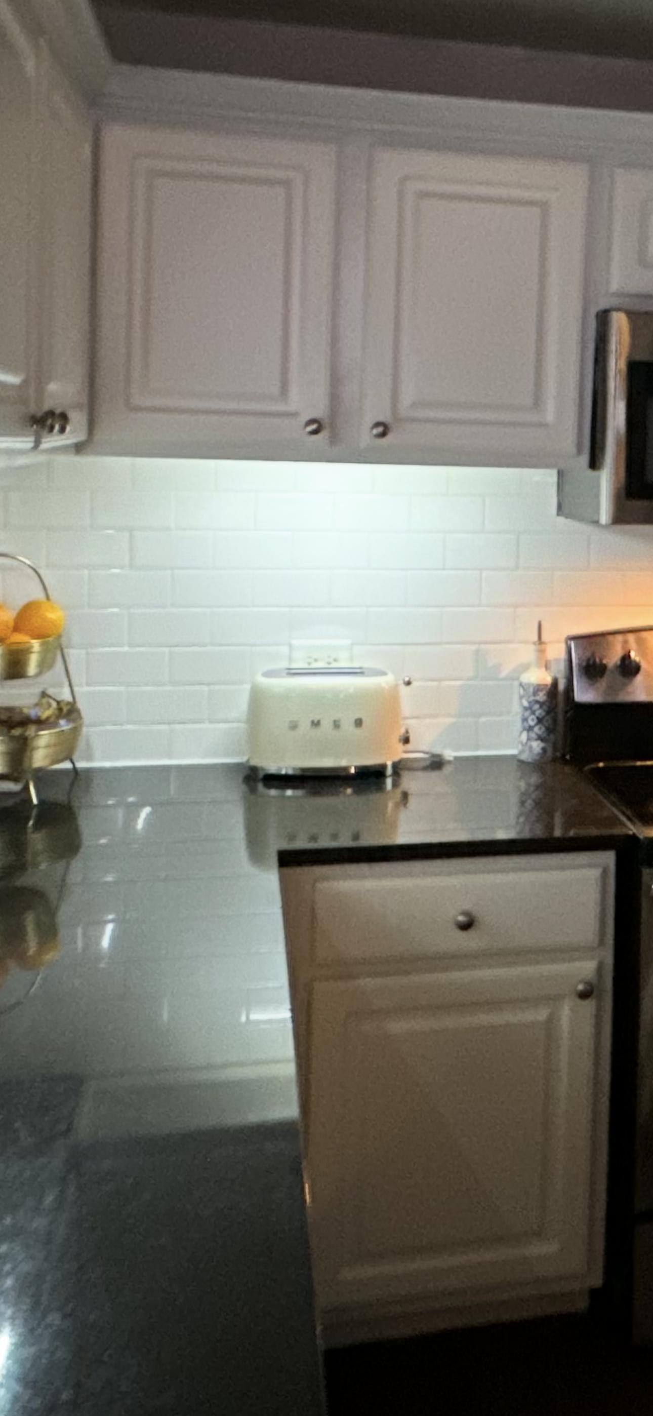 Customer photo of a cream SMEG toaster on a kitchen counter
